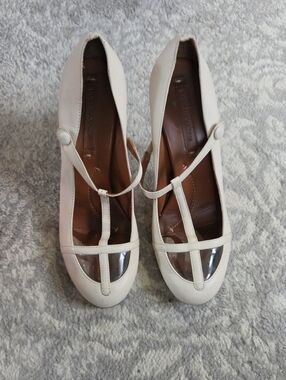 BCBGMaxAzria Cream T-Strap Pumps with Clear Toe Insets